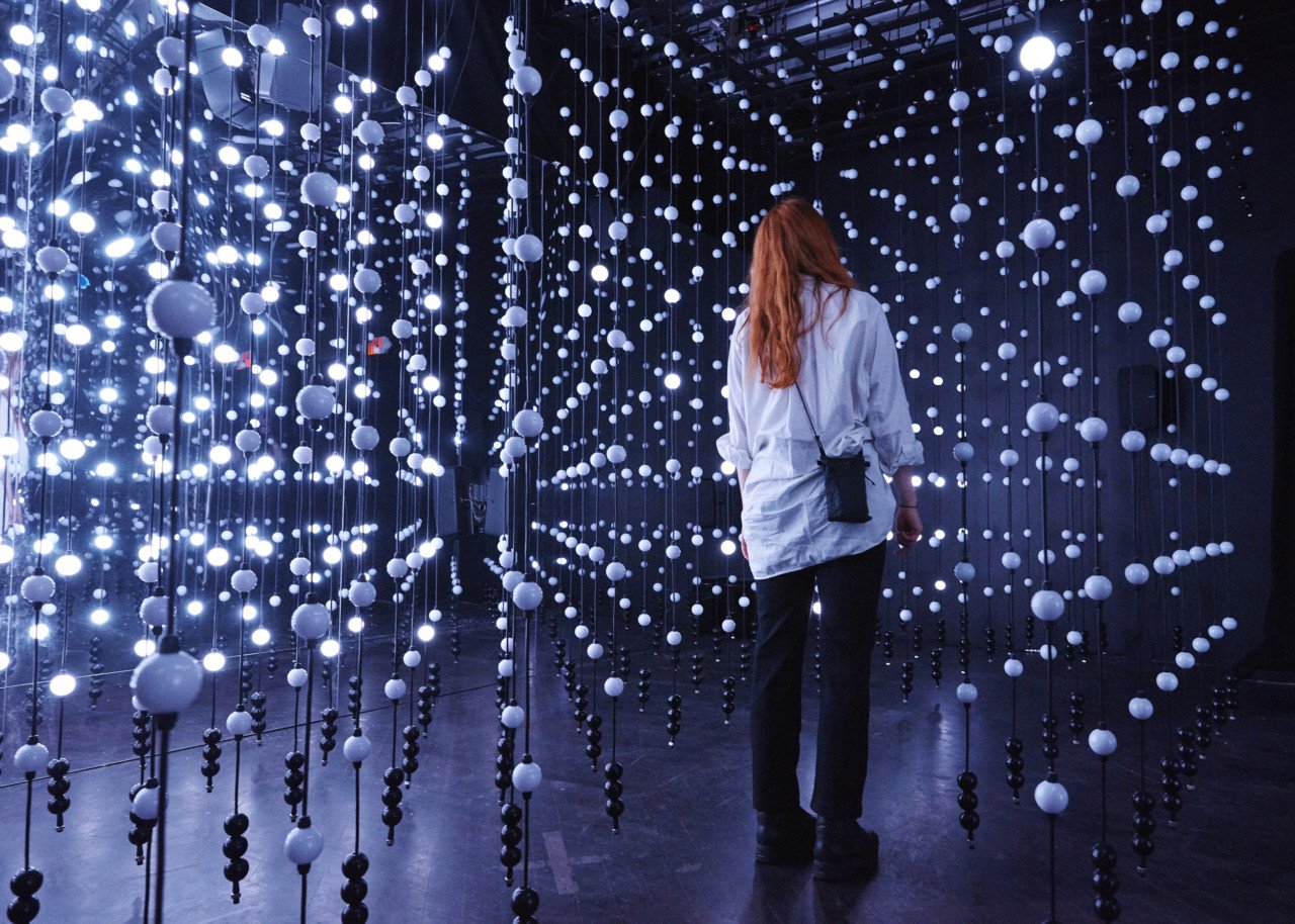 Performer in an immersive art-and-sound installation