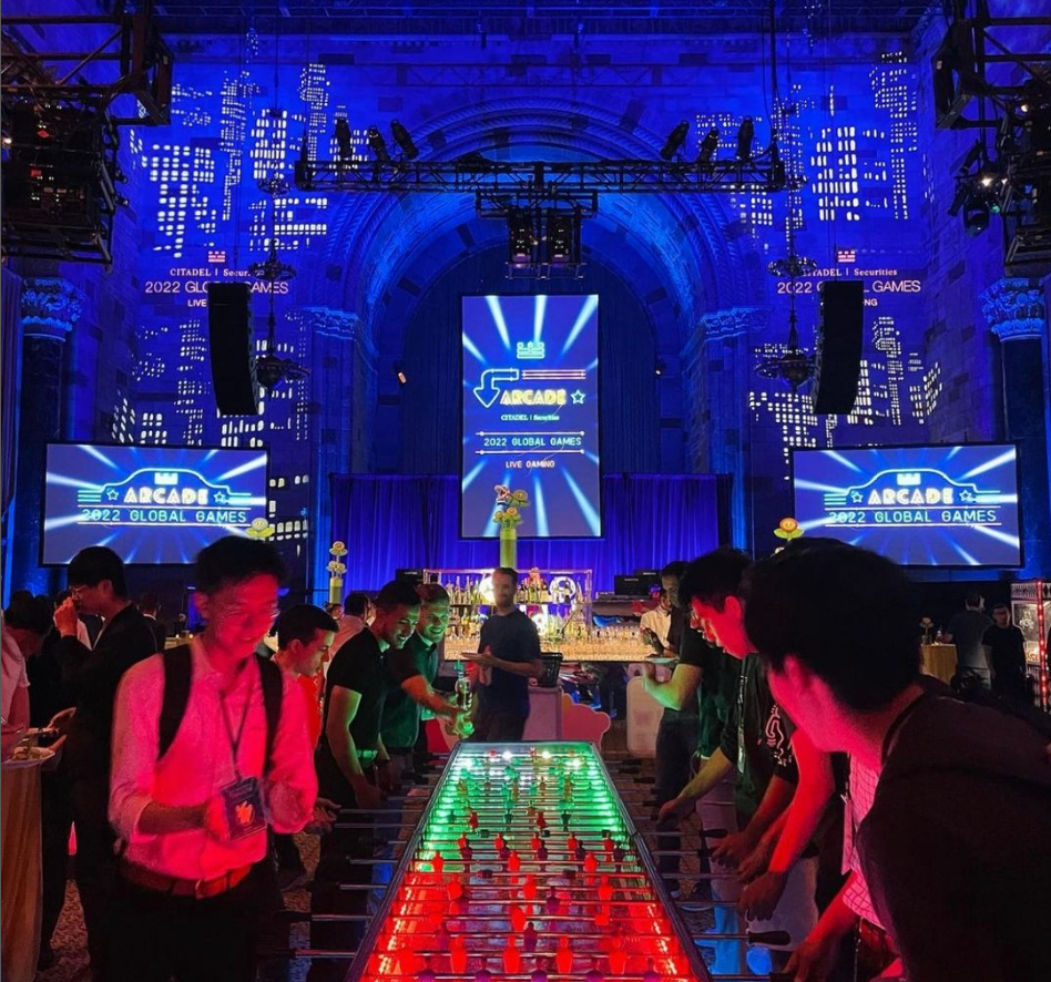 Blue and purple cityscape projection at a live production